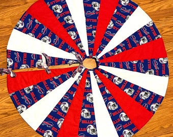 My team my town 21”tree skirt length from center fits around my 5-8 foot tree