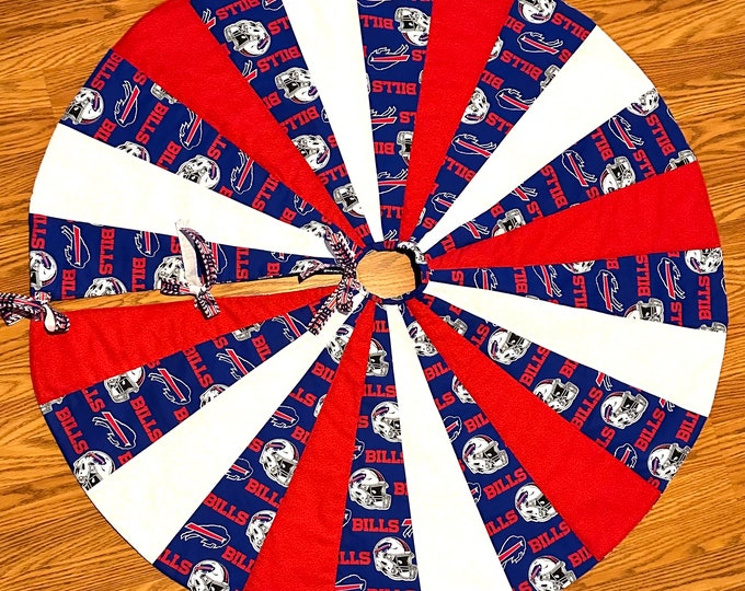 My team my town 21”tree skirt length from center fits around my 5-8 foot tree