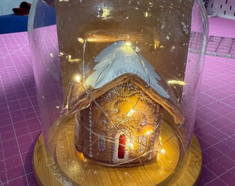 Snow globe gingerbread house 6” diameter 6 1/2 inches tall