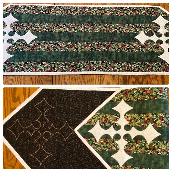 Christmas runner/table scarf. Green stripe with appliqué star at each end. Backing is black with gold shape for star