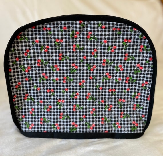 Handmade 2 slice toaster cover . Double sided quilted cotton fabric.