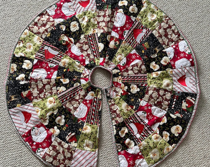 Santa tree skirt 20” with embroidered Santa hats length from center