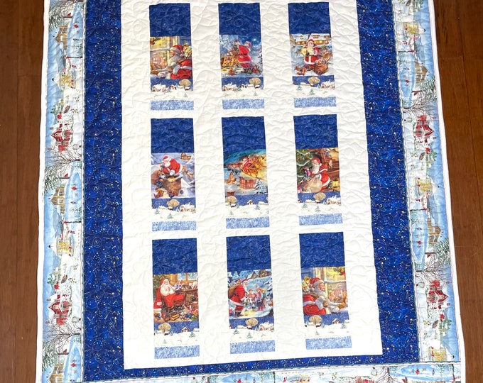 What Santa does / custom quilt 57” x 67” machine quilted cotton blanket with minky soft back machine sewn border