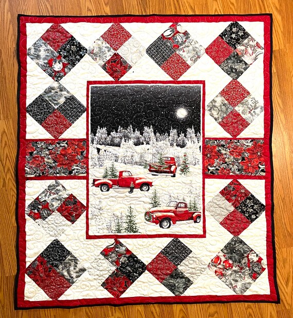 Red Truck Christmas 46” x 53”machine quilted swirling lightweight blanket, machine sewn border