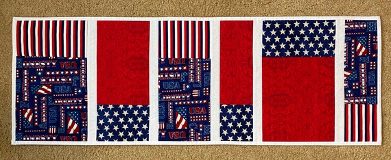 Reversible table runner, 38 by 13 inches with each side a different pattern