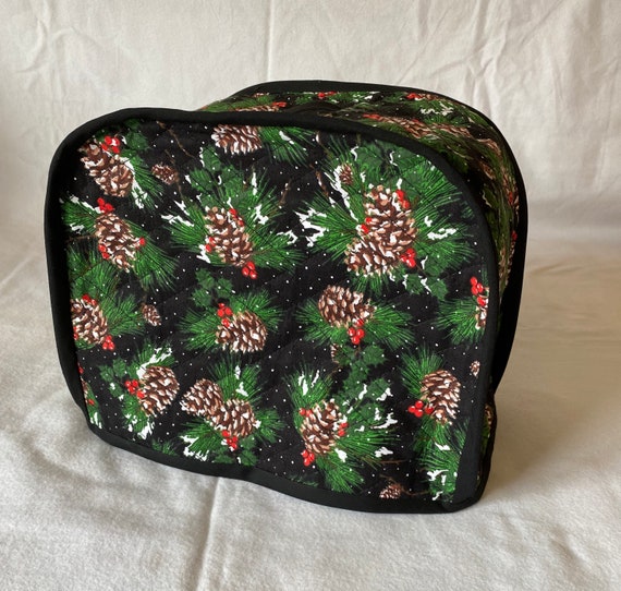 2 slice toaster cover, reversible double sided quilted fabric. Can be ordered in 4 slice.