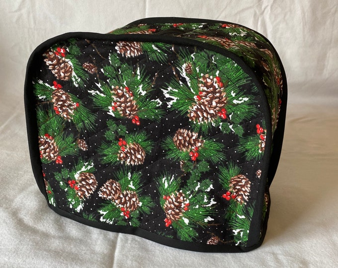 toaster cover, reversible double sided quilted fabric. Can be ordered in 4 slice.