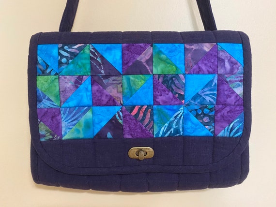 Quilted shoulder bag with adjustable strap
