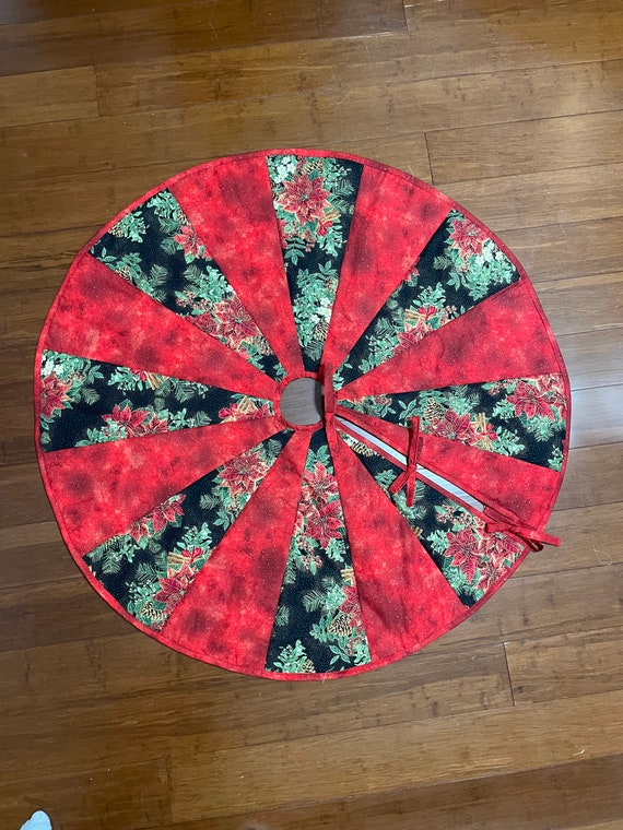 Poinsettia tree skirt 22” length from center