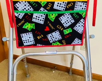 Walker bag. One of a kind, deluxe walker bag or wheelchair carryall made with more thickness to accommodate more pockets. Bingo theme fabric