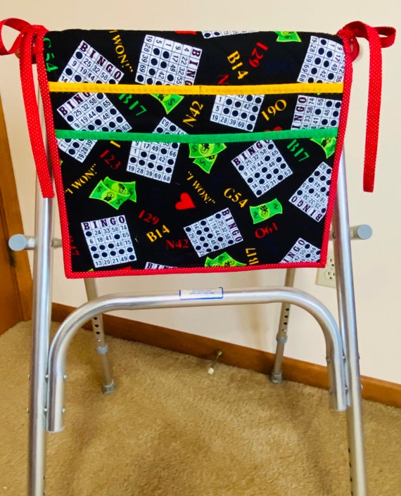 One of a kind, deluxe walker bag or wheelchair carryall made with more thickness to accommodate more pockets. Bingo theme fabric