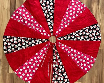 It’s all Santa tree skirt 42” across reversible
