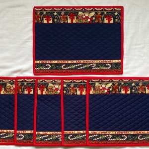 Holiday placemats decorated with candy canes and gingerbread