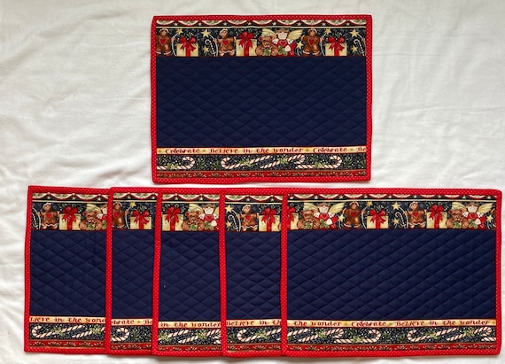 Holiday placemats decorated with candy canes and gingerbread