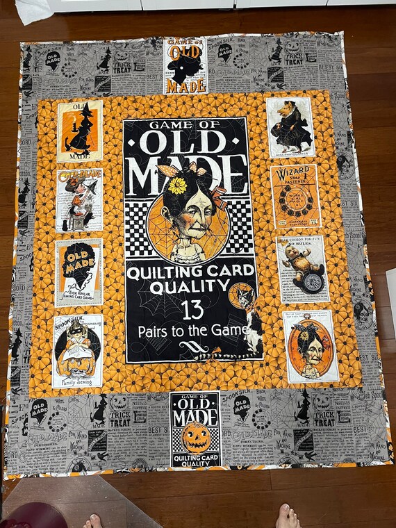 Sewing themed homemade Halloween quilt with 57” x 70”