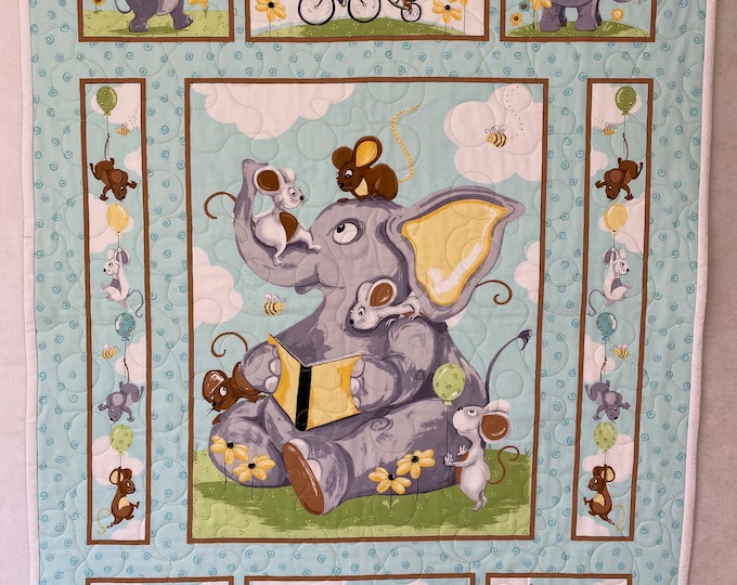 Baby quilt, wall hanging, or play blanket. Playful elephants - measures 32” by 42” Machine appliqué and quilted, hand stitched binding