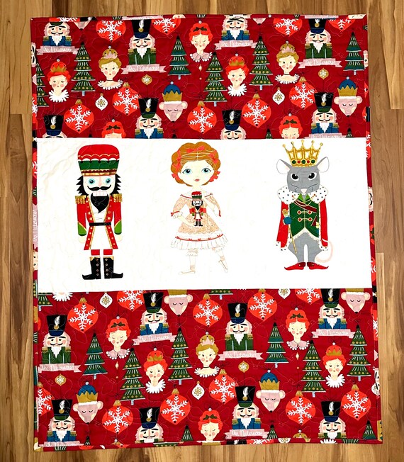 Nutcracker quilt 40” x 52 lightweight homemade quilted blanket with flannel back