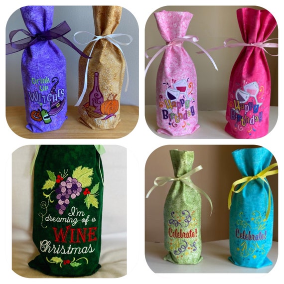 Embroidered reusable gift bags for wine. The bag is also a gift to be used again and again.