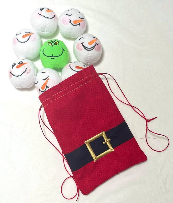 Snowball fight indoors 7 snowballs and Santa bag 7 1/2” x 10 1/2” bag and one meanie