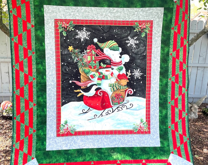 Reduced snowman 64” x 74” machine quilted snowman theme, lightweight blanket dark green back swirling embroidered