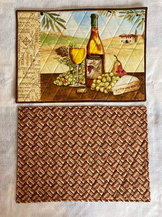 Placemats/ Attractive wine theme quilted placemats. Sold in pairs of 2.