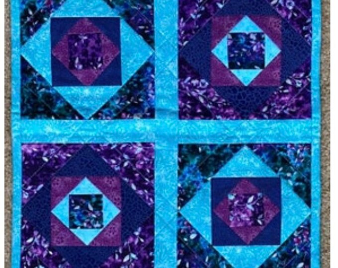 Reversible table runner. 27” by 13”.