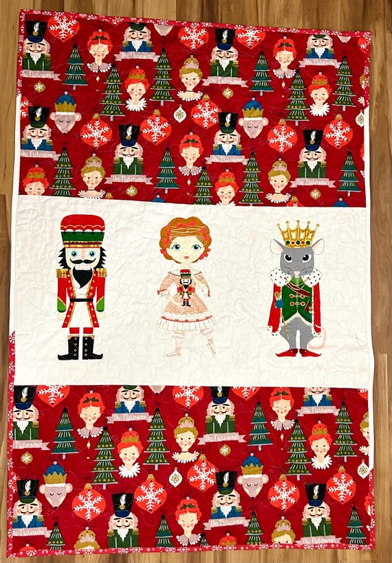 Nutcracker quilt 41” x 60” lightweight homemade quilted blanket with cotton snowflake back