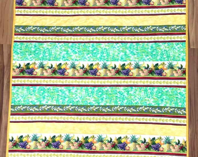 Fruity quilt, picnic, car rides/ plane trips or play blanket.  measures 43”x49”