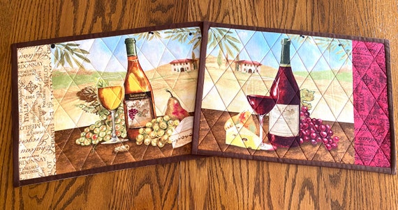 Placemats/ Attractive wine theme quilted placemats. Sold in pairs of 2.