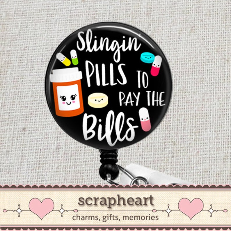 May include: Black and white badge reel with a black and white cartoon pill bottle with the text "Slingin' Pills to Pay the Bills".
