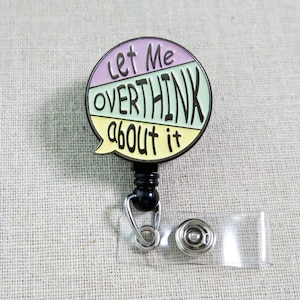 May include: A colorful badge reel with a speech bubble design that says "Let me overthink about it".