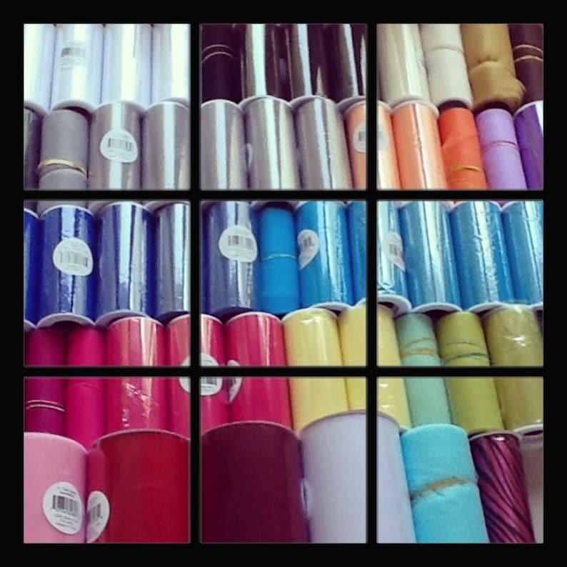 May include: A variety of colorful ribbon spools in different colors and textures, including pink, blue, green, yellow, and white.
