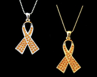Collar con colgante de lazo de cristal naranja para concienciar sobre la leucemia, el cáncer de riñón, la esclerosis múltiple y el TDAH. Tono plateado y dorado.