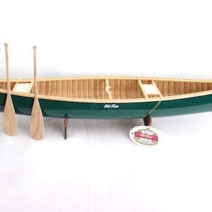 Authentic Old Town wood and canvas canoe replica.Length 23 inches.Built and signed by the artist,in Maine.