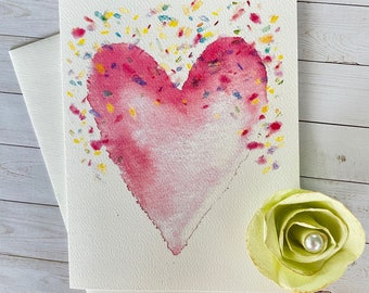 Carte de voeux coeur rose avec confettis