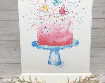 Impression de carte de correspondance illustration aquarelle. Gâteau rose aux confettis avec des papillons flottants.