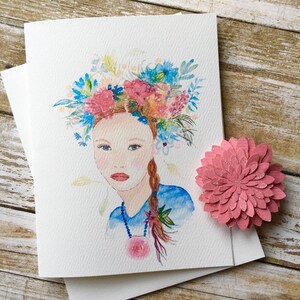 Carte de voeux avec illustration aquarelle. Fille avec des fleurs dans les cheveux, rêvant de printemps image 1
