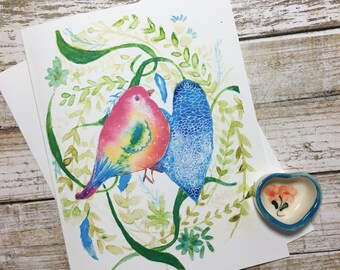 Carte de correspondance aquarelle. Petit oiseau rose dans le jardin d'amour