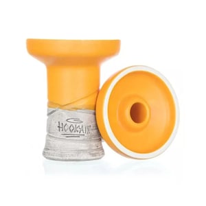 May include: A yellow ceramic hookah bowl with a white rim and a white base with the word "HOOKAIR" printed on it.