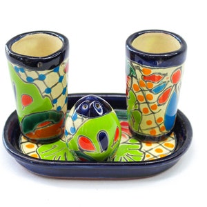 Set of tequila glasses with salt shaker