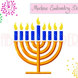 May include: A machine embroidery design featuring a golden menorah with nine blue candles, each topped with a yellow flame. The text Machine Embroidery Design appears in a pink box at the top, with green and pink dotted firework patterns.