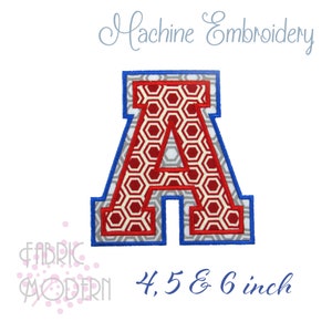 May include: Machine embroidery design of the letter A in a red, white, and gray geometric pattern with a blue outline. The design is available in 4, 5, and 6 inch sizes.