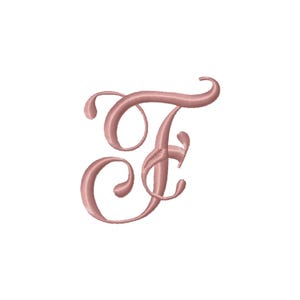 May include: A rose gold embroidered letter "F" in a cursive script. The letter has a flowing, elegant design with decorative swirls and loops. The embroidery has a subtle sheen, and the letter is set against a plain white background.