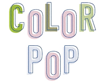 May include: An embroidery design featuring the text COLOR POP in two rows. The letters are stitched in light green, soft pink, olive green, and light blue, each outlined with a dark navy blue thread to create a layered, dimensional effect.