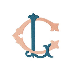 May include: An embroidered monogram featuring a large, peach-colored letter C intertwined with a dark teal letter L. The design showcases a decorative, serif-style font with intricate curves and pointed terminals, rendered in a dense stitch pattern.