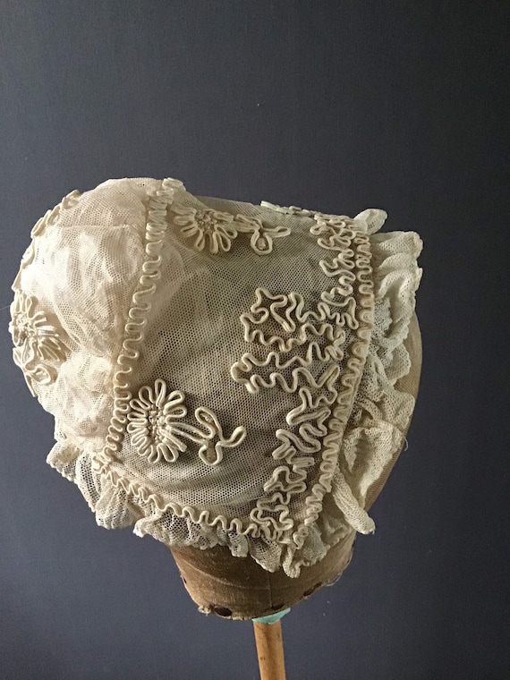 1920s childs lace bonnet with soutache embroidery