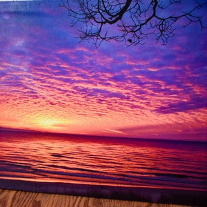 Amazing colors in the sunset over Lake Michigan. I took this photo at Hoffmaster State Park, it is on a 16x20 ready to hang canvas.