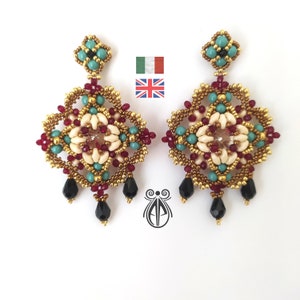 May include: A pair of gold, red, white, turquoise, and black beaded earrings with a geometric design. The earrings have a dangling drop with black beads.