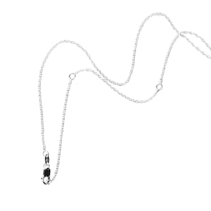 May include: A silver chain necklace with a lobster clasp.