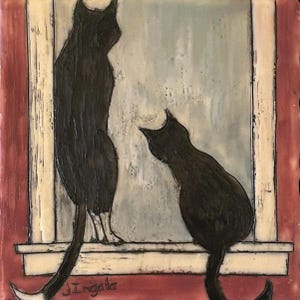 May include: A square ceramic tile featuring a painting of two black cats. One cat stands tall, the other sits, both facing a window. The background is a mix of white, gray, and red. The artist's signature, "J. Ingala", is visible.